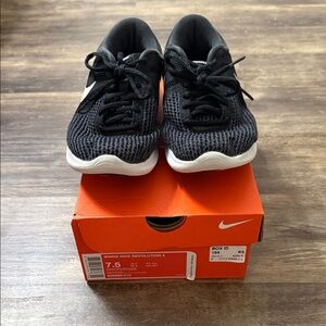 Nike Women’s Revolution 4 Black and White Sneakers